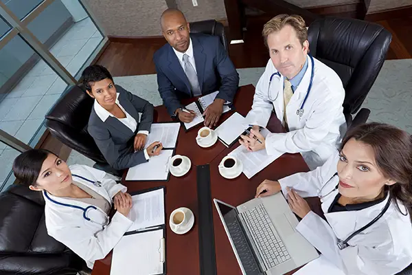 hospital administrators at conference table